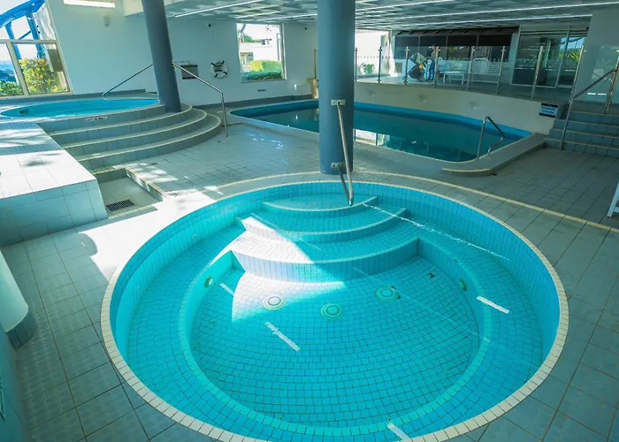 Surfers Aquarius On The Beach